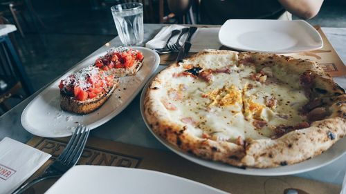 High angle view of pizza on table