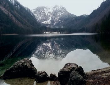 Panoramic view of lake and mountains against sky