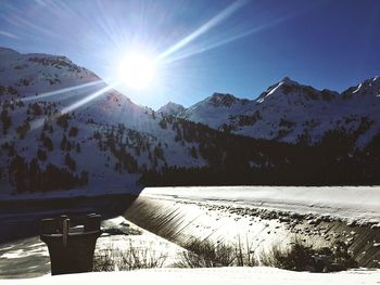 Scenic view of snow covered mountains
