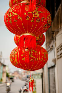 Red lanterns hanging in front of lantern