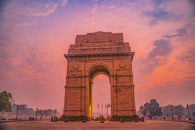 Low angle view of monument at sunset