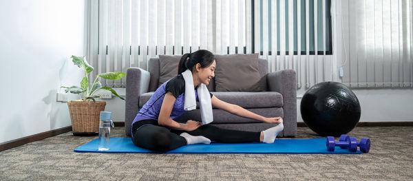 Woman exercising in gym