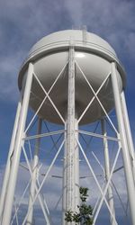 Low angle view of water tower against sky