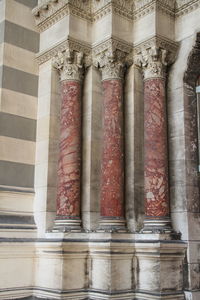 Close-up of red objects on wall