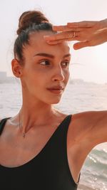 Portrait of young woman at beach