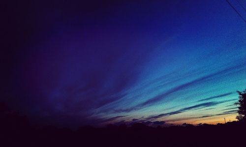 Low angle view of dramatic sky at sunset