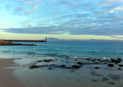 Scenic view of sea against sky during sunset