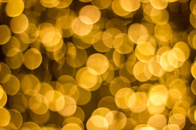 Defocused image of illuminated christmas lights