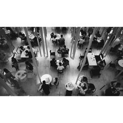 High angle view of people walking on table