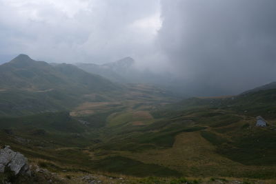 Scenic view of valley against sky