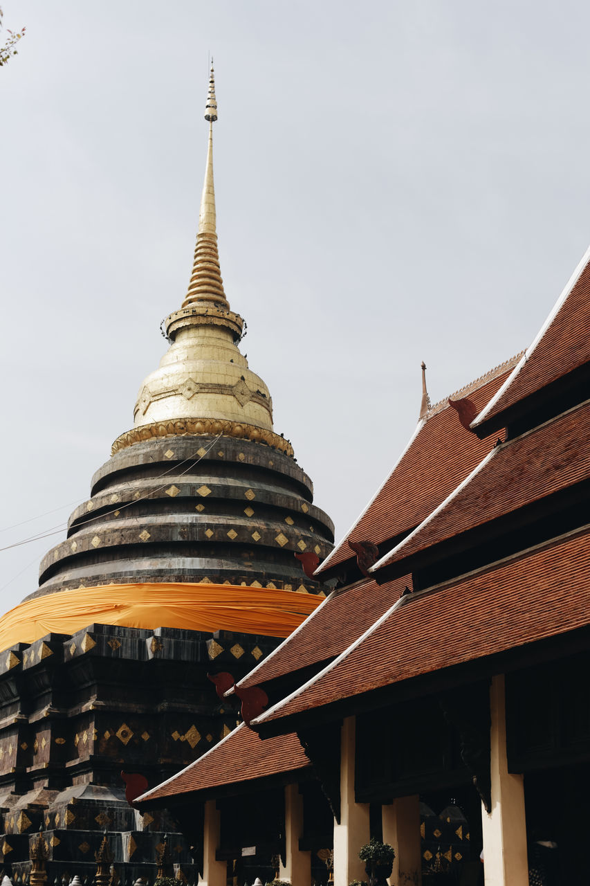 LOW ANGLE VIEW OF PAGODA AGAINST SKY IN CITY