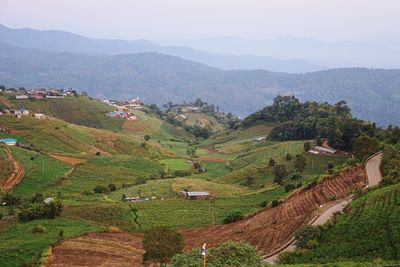 High angle view of agricultural landscape against sky