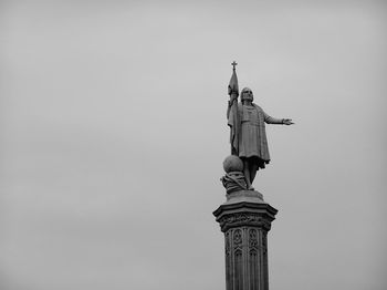 Low angle view of statue against the sky