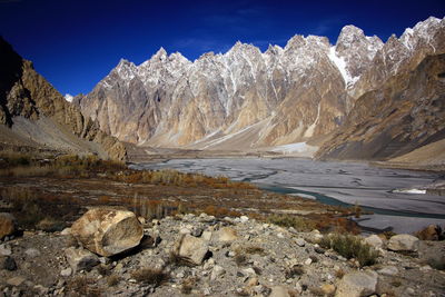 Scenic view of snowcapped mountains against sky