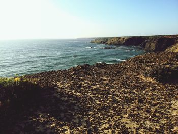 Scenic view of sea against clear sky