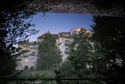 Building with trees in background