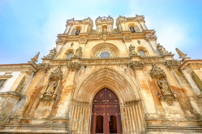 Low angle view of historical building against sky