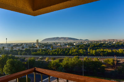 Scenic view of city against clear sky