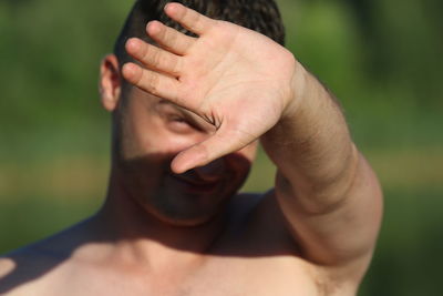 Close-up of shirtless man