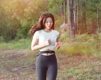 Full length of woman standing on land