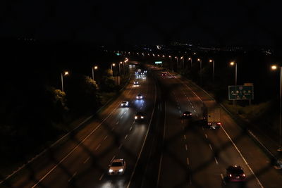 High angle view of traffic on road at night