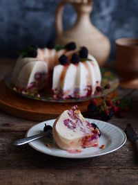 Sweet food in plate on table