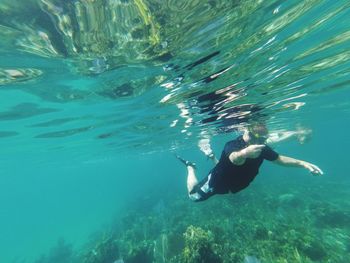 Man swimming in sea