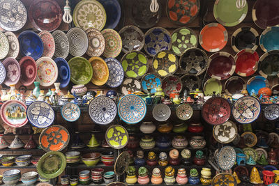 Shop selling ceramic pots and dishes in medina in marrakesh