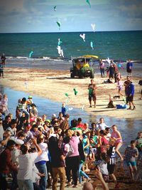 People enjoying at beach