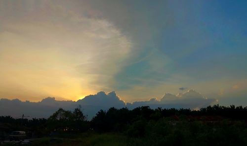 Scenic view of landscape against sky during sunset