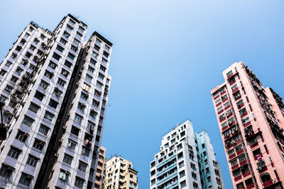 Low angle view of buildings against clear sky