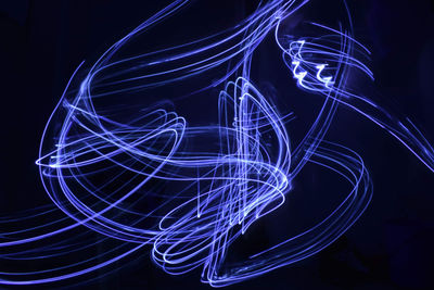 Light painting against black background