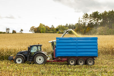 Tractor on field during harvest