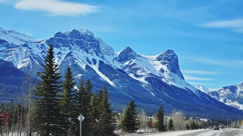 Scenic view of snowcapped mountains against sky