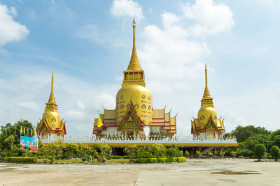  wat pong agas temple is a famous buddhist temple with a large golden pagoda and lord ganesha