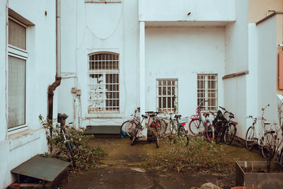 Bicycles parked against building 