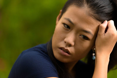 Close-up portrait of young woman