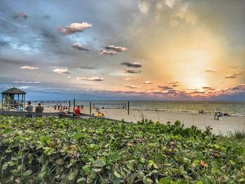 Scenic view of sea against cloudy sky