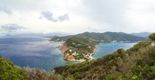 Aerial landscape view of the little peninsula of monte enfola in elba island, italy