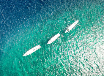 High angle view of boat sailing on sea