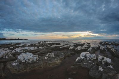 Scenic view of sea against sky at sunset