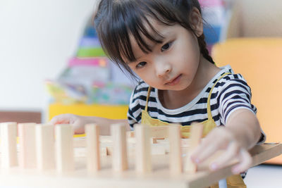 Portrait of cute girl with toy