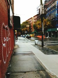 Road in city against sky