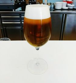 Close-up of beer glass on table