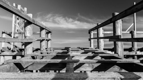 Pier on bridge against sky