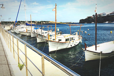 Boats moored in marina