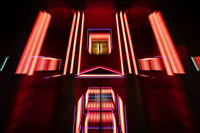 Low angle view of illuminated building at night