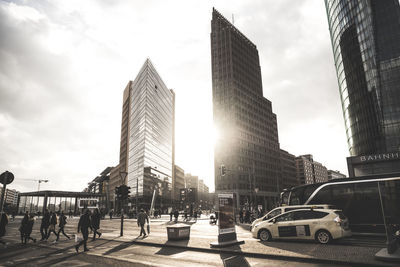 View of skyscrapers against cloudy sky