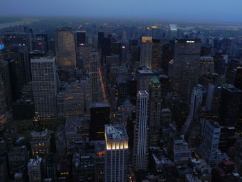 High angle view of illuminated buildings in city