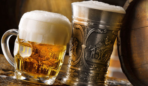Close-up of beer glass on table